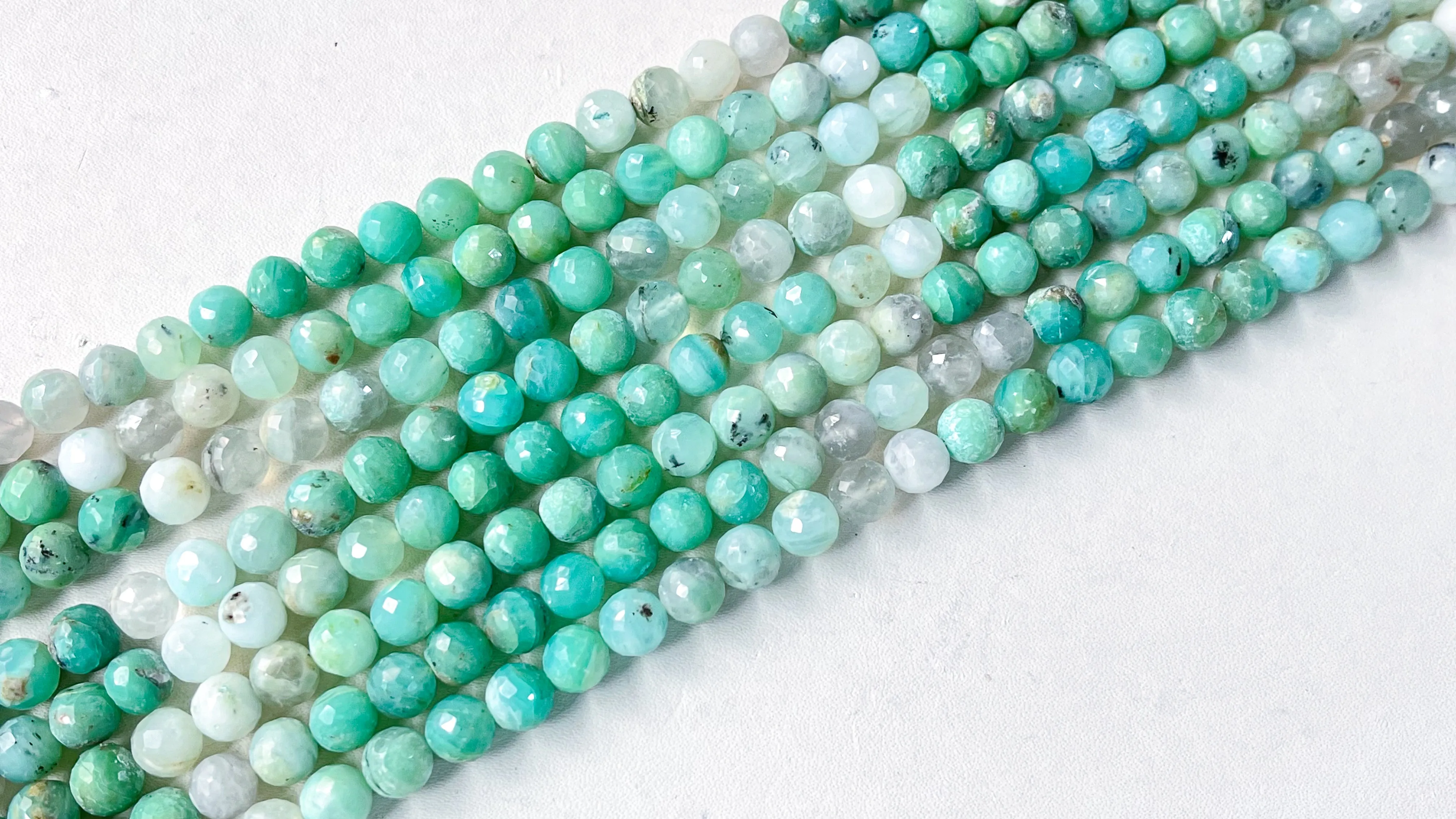 Peru Opal Micro Faceted Spherical Shape Beads