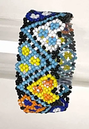 Small bead wide woven floral design beaded bracelet - Togo