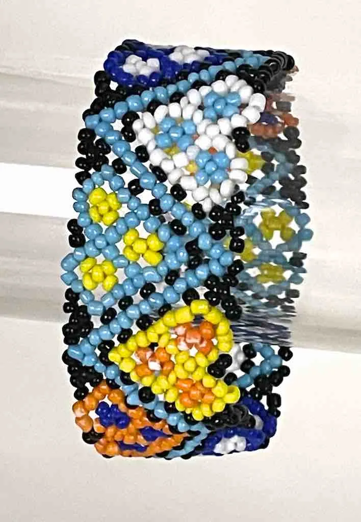 Small bead wide woven floral design beaded bracelet - Togo
