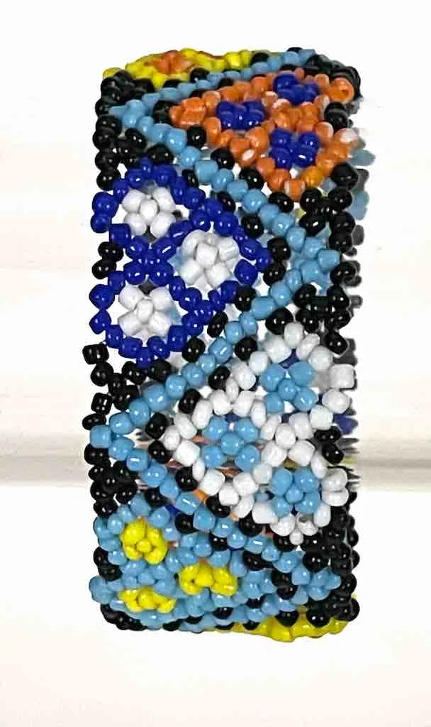 Small bead wide woven floral design beaded bracelet - Togo